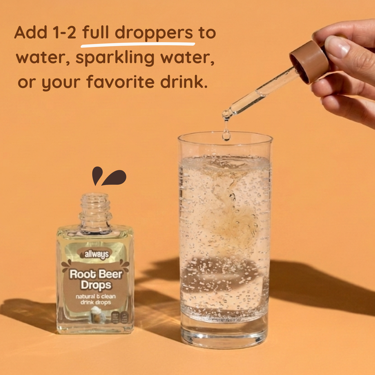 Root beer drops being added to a glass of water with text on an orange background