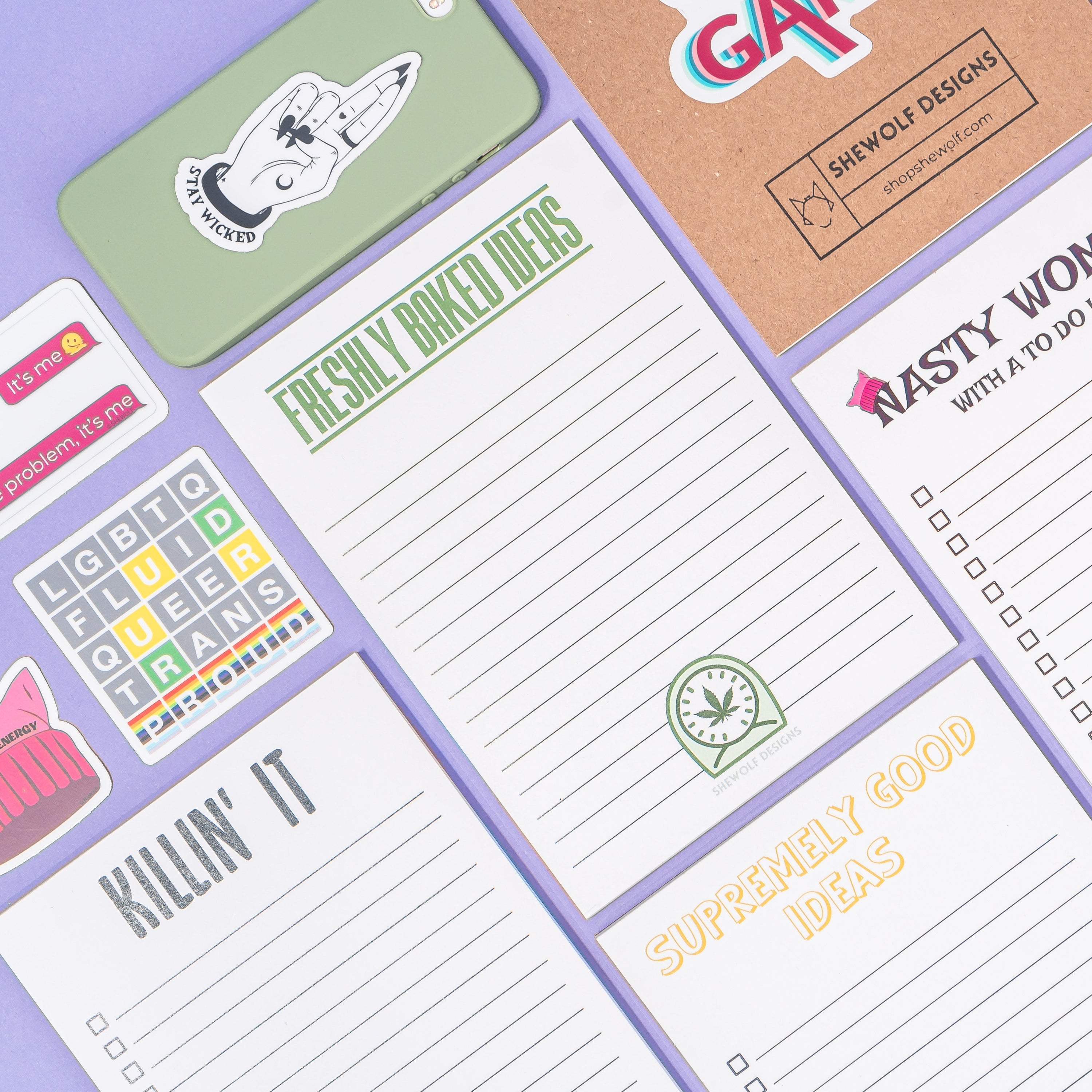 Collection of colorful notepads with various designs and text.