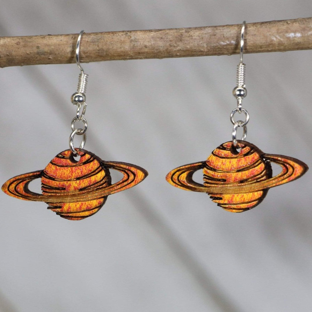 Hand-painted wooden Saturn planet dangle earrings with ringed space design and hypoallergenic sterling silver hooks, lightweight Saturn statement jewelry earrings for astronomy lovers and cosmic style