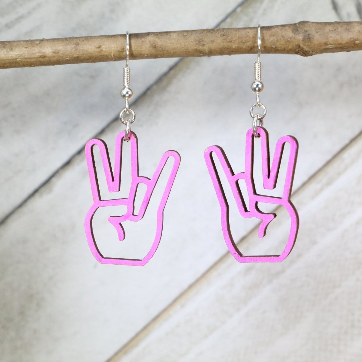 Hand-painted wooden shocker hand dangle earrings with cheeky adult humor design and hypoallergenic sterling silver hooks, lightweight novelty statement jewelry earrings for edgy and playful style pink