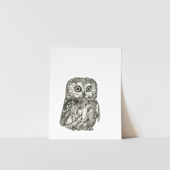 A black and white print of a saw-whet owl on a white background, with a visible artist&