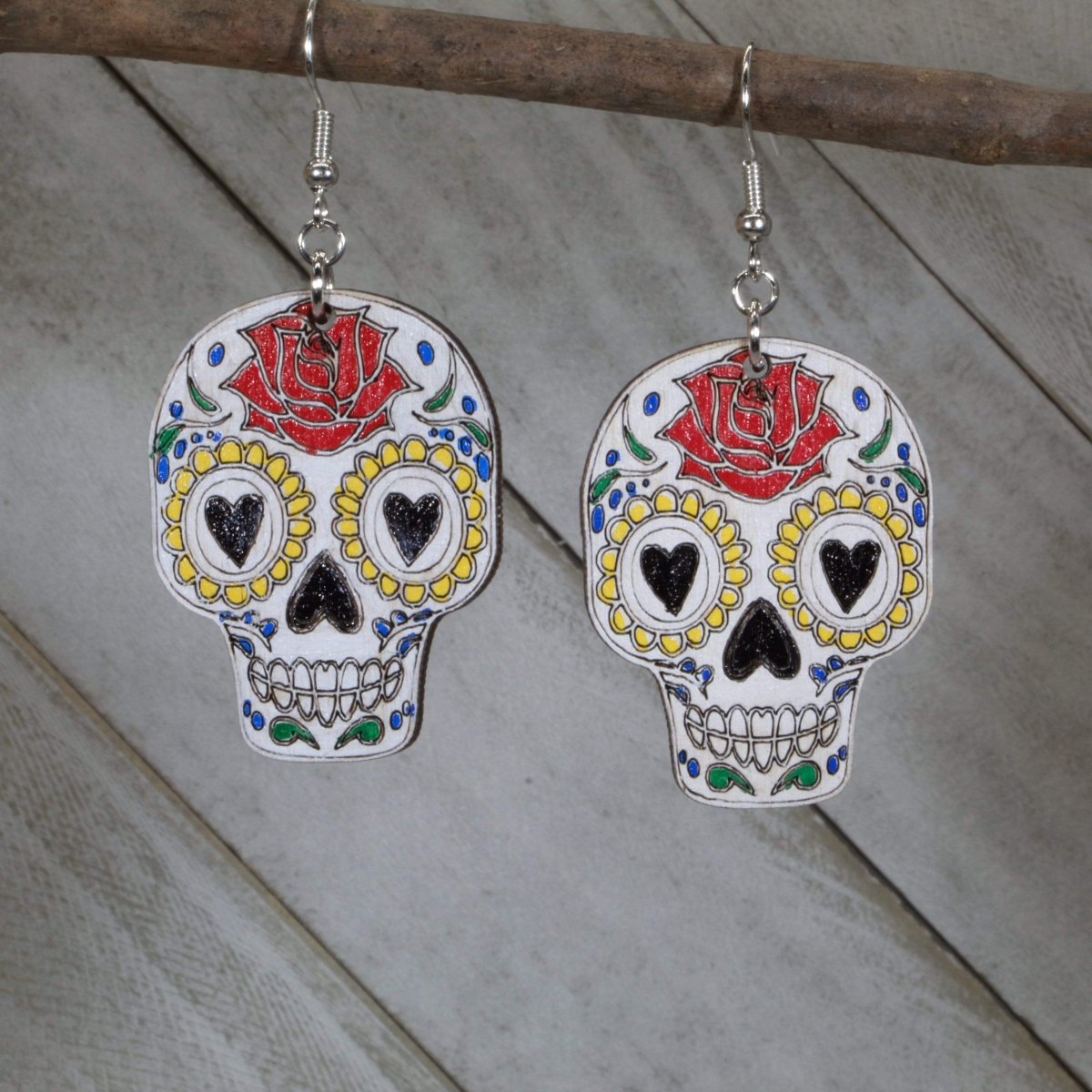 Hand-painted wooden sugar skull dangle earrings with Day of the Dead design and hypoallergenic sterling silver hooks, lightweight skull statement jewelry earrings for Dia de los Muertos style