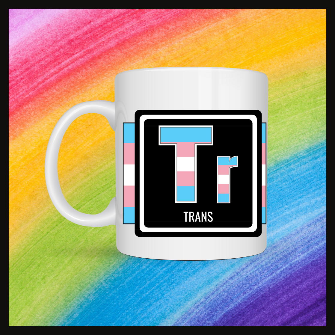 Mug with Trans pride colors of lightblue, pink and white, inside a black square on a white ceramic mug. Background is a rainbow.