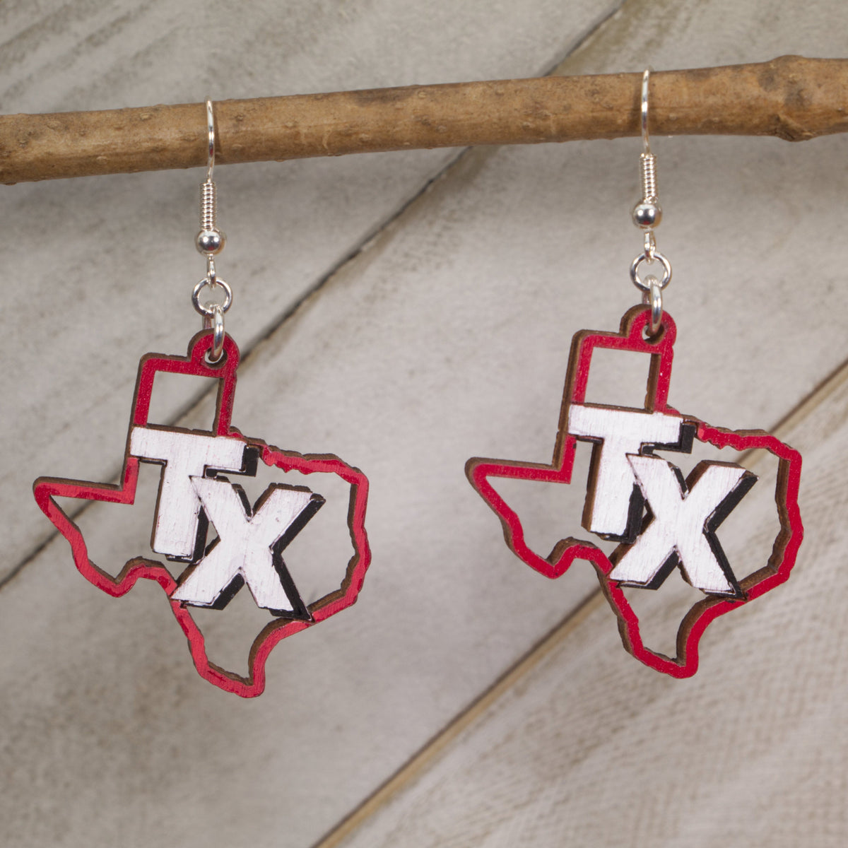 Hand-painted wooden Texas TX dangle earrings with bold state outline design and hypoallergenic sterling silver hooks, Texas state pride southern jewelry earrings