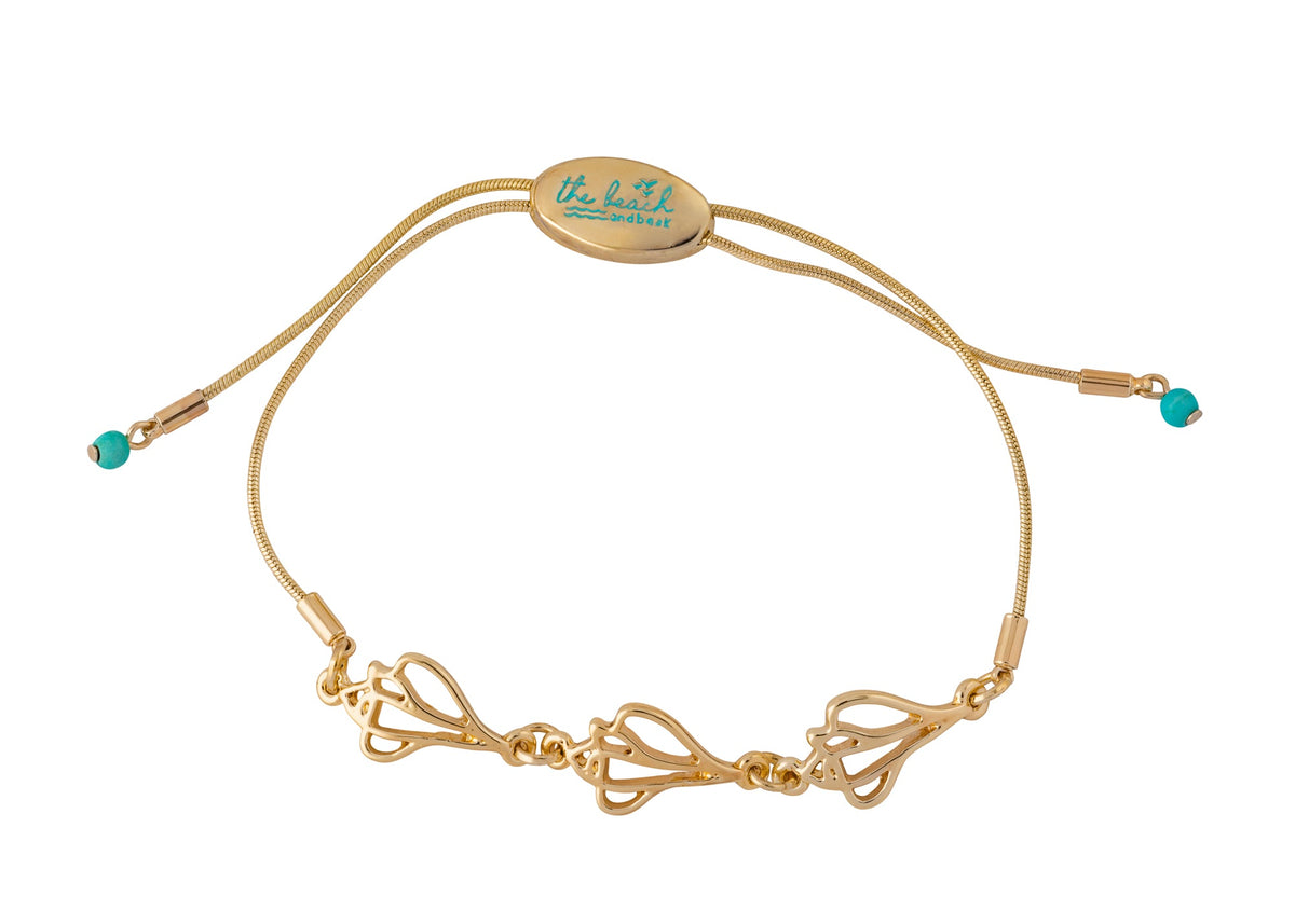 the beach and back plum island triple whelk shell slider bracelet