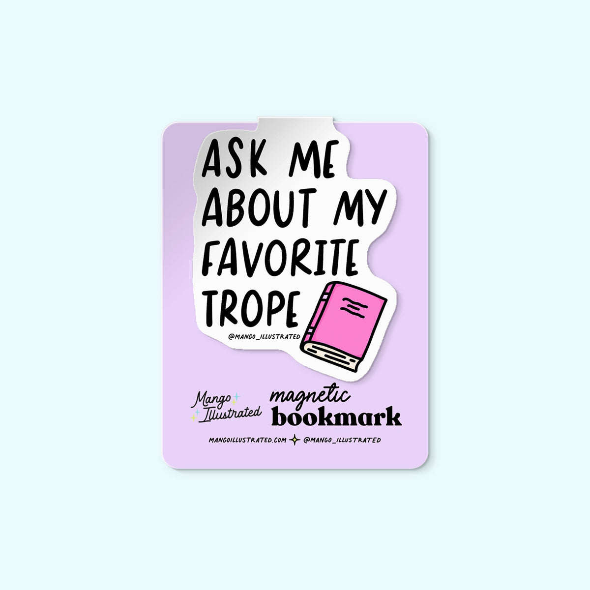 Ask Me About My Favorite Trope magnetic bookmark detail — hand lettered BookTok page marker on a book by indie artist MangoIllustrated