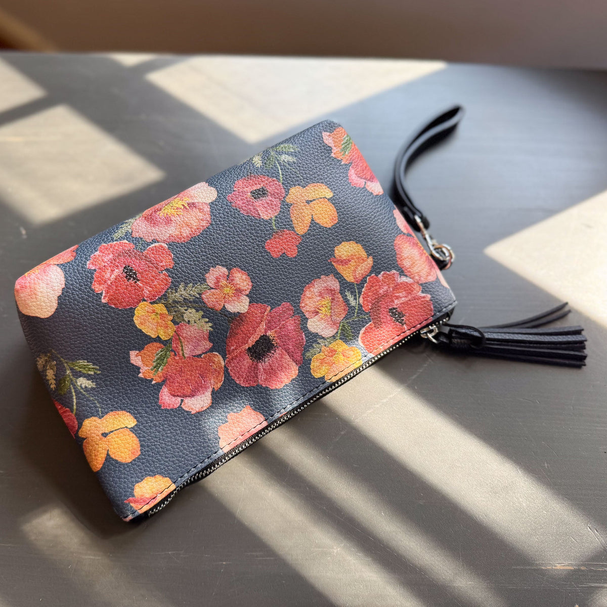 the ember poppies clutch collection in vegan leather