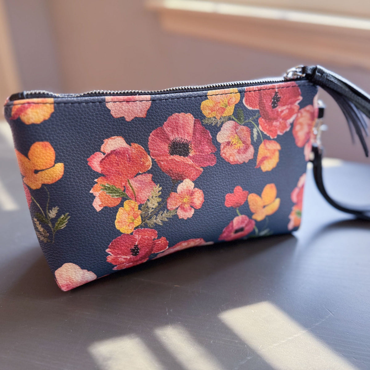 the ember poppies clutch collection in vegan leather