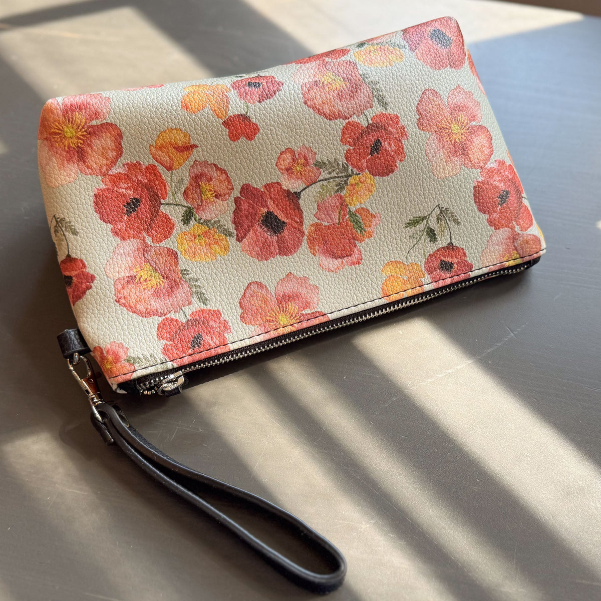 the ember poppies clutch collection in vegan leather