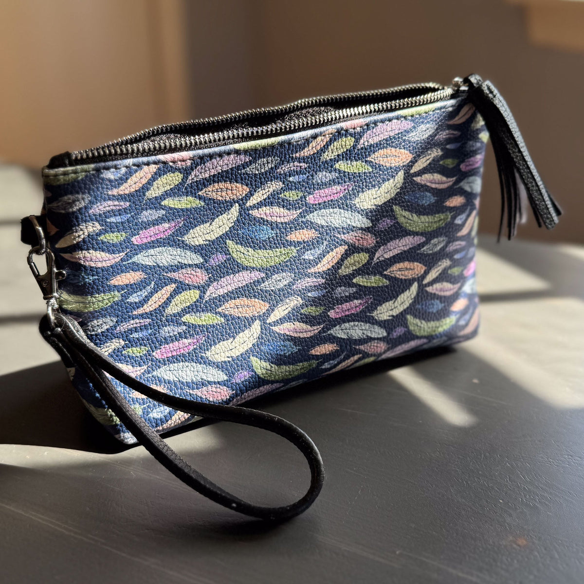 the featherlight clutch collection in vegan leather