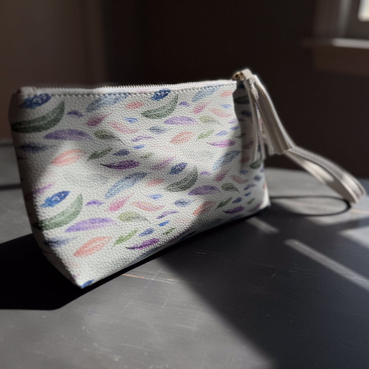 the featherlight clutch collection in vegan leather