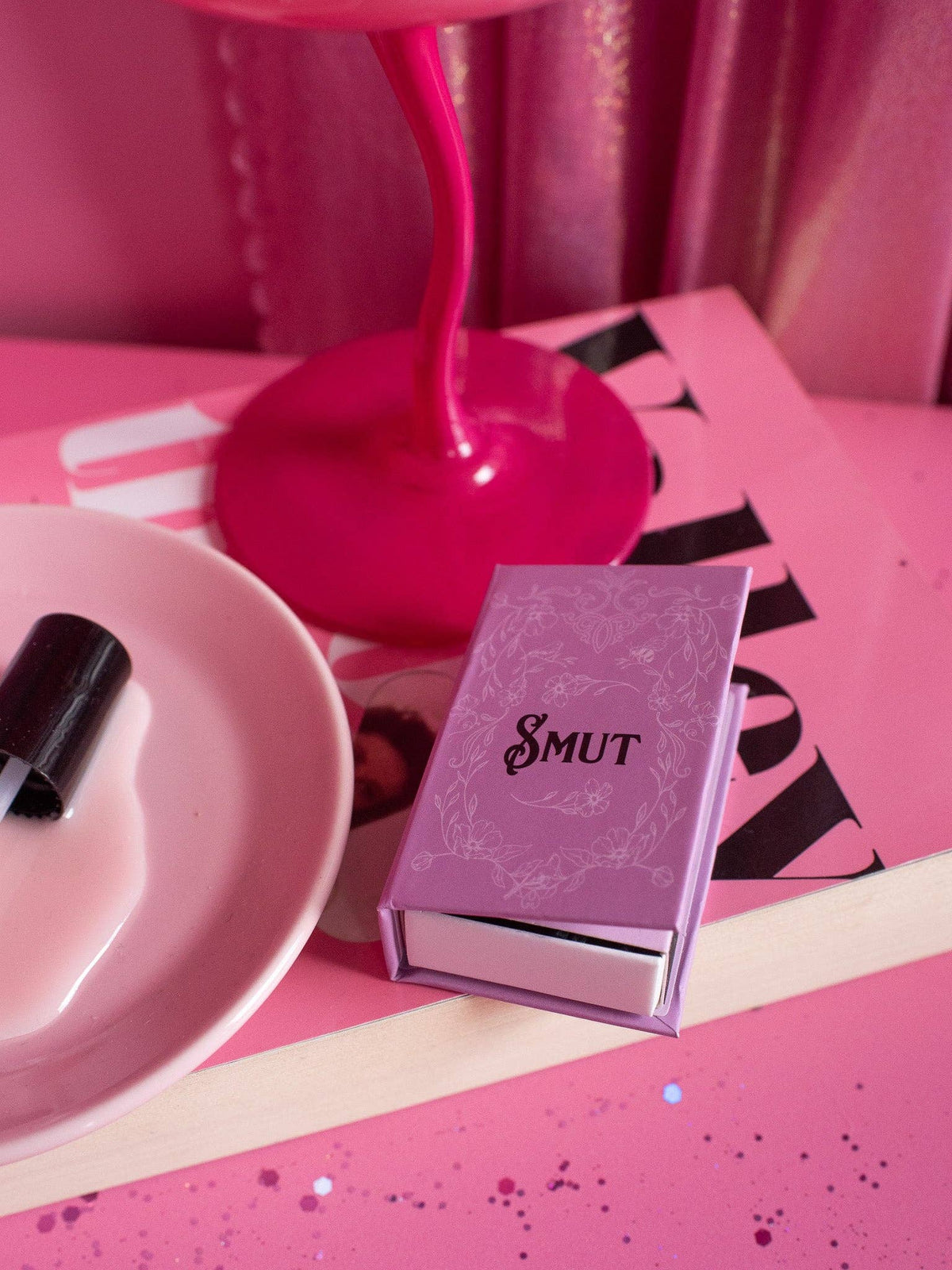 Pink book titled &