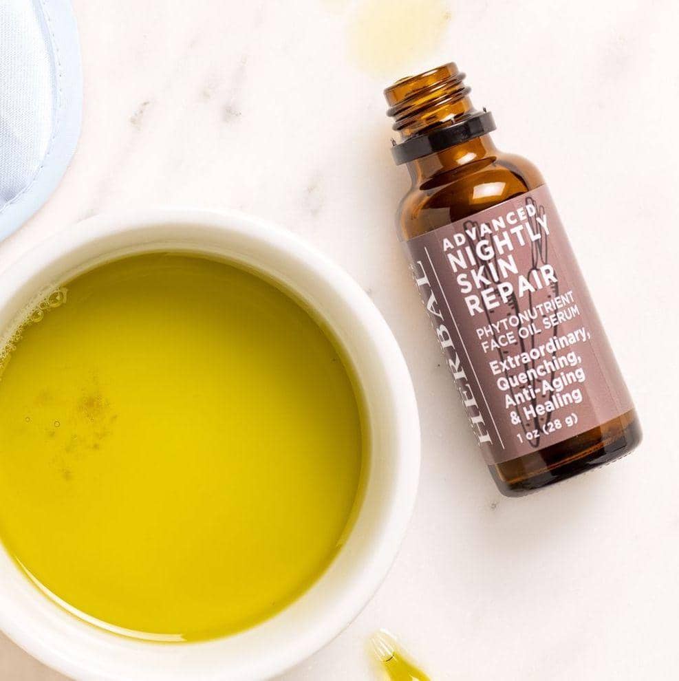 Advanced Nightly Skin Repair Face Oil Serum Indoor Texture Lifestyle 1oz Bottle