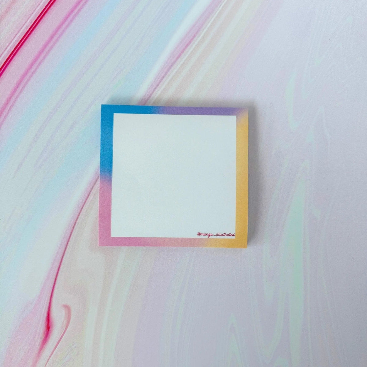 Afterglow sticky notes flat lay — pastel sunset sticky note pad on a desk by indie artist MangoIllustrated