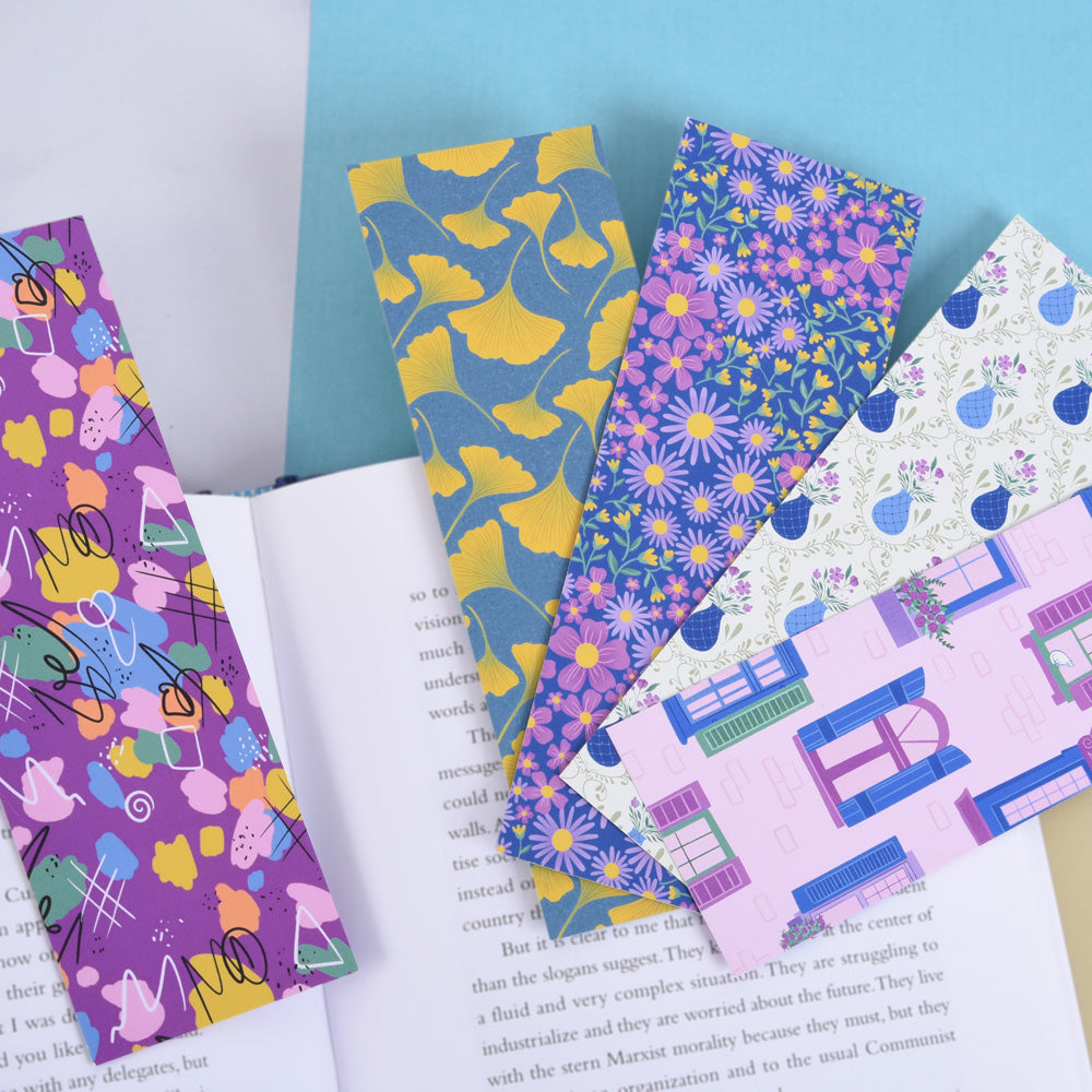 fanned out bookmarks resting on an open book