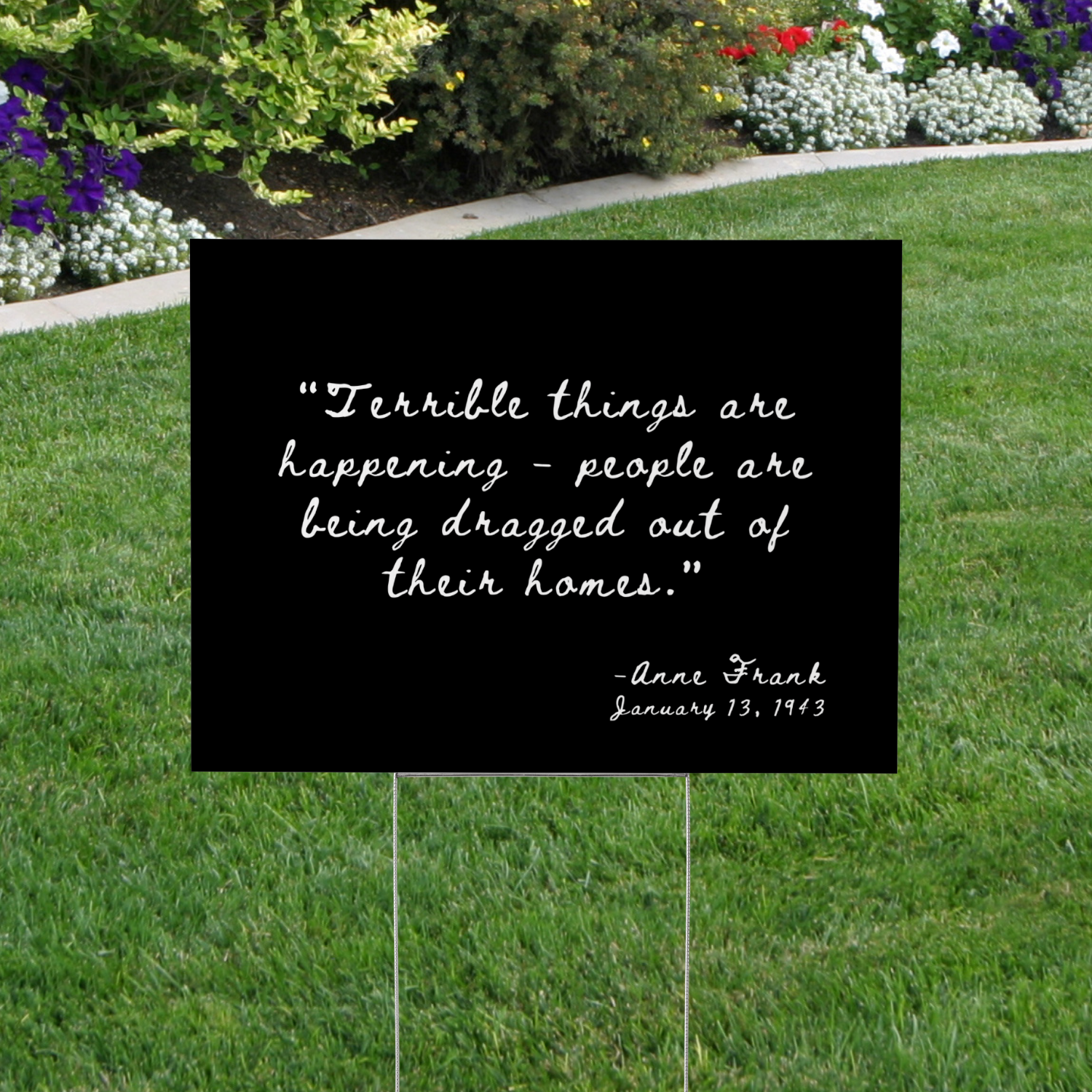 black yard sign with anne frank quote - anti-ICE