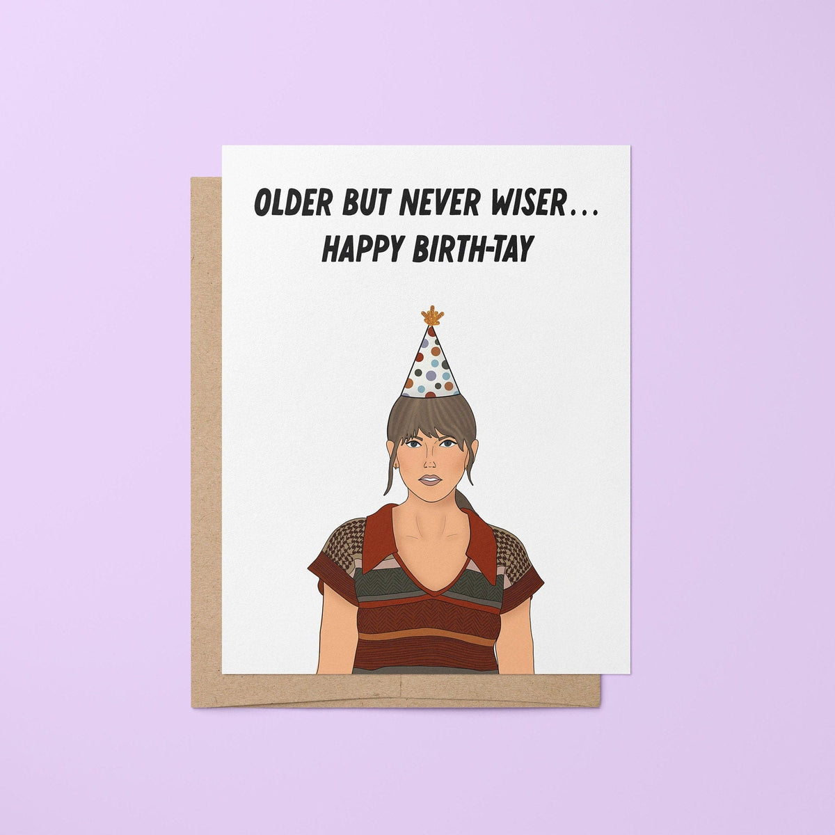 Anti-hero birthday card — hand lettered "Older but never wiser, happy birth-tay!" with an illustrated party hat, 4.25 x 5.5 in folded card, by MangoIllustrated