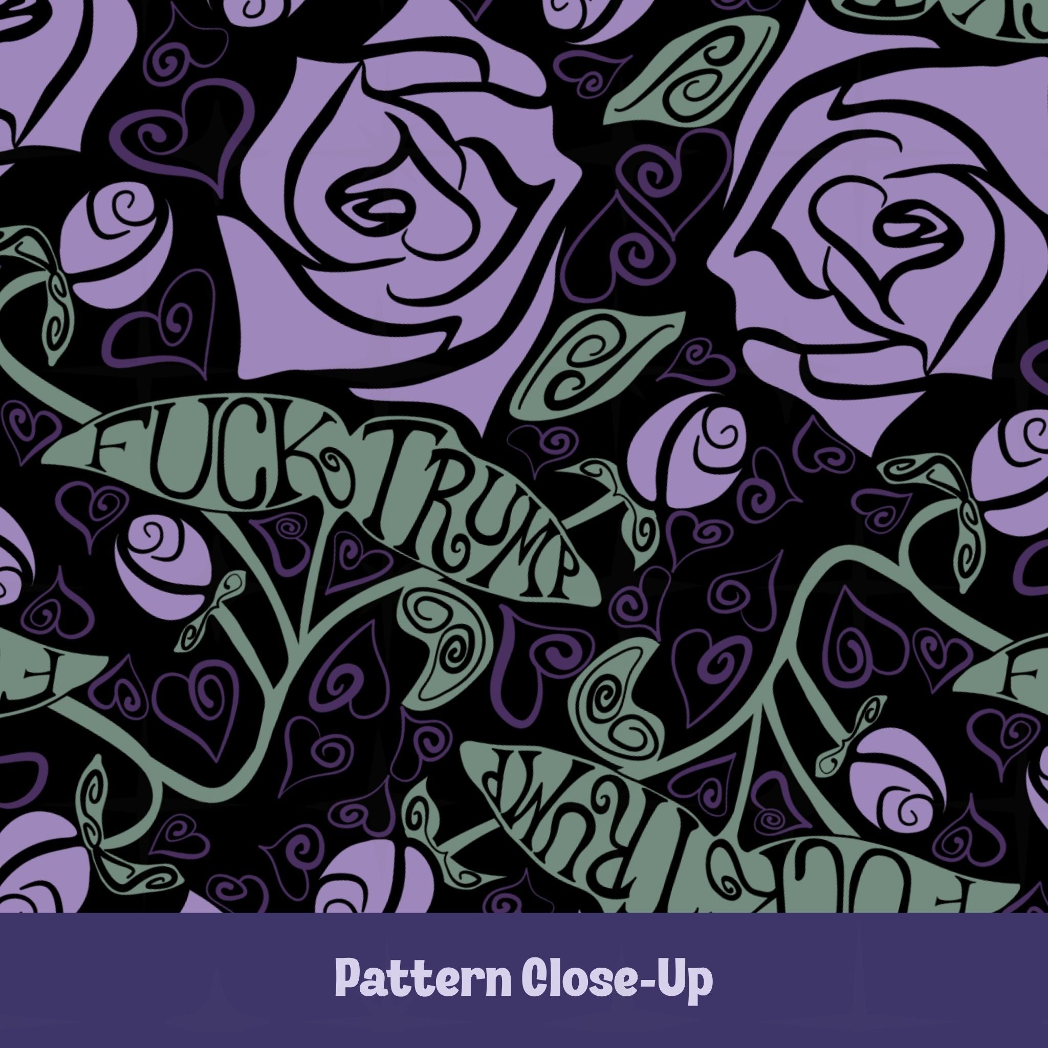 Close-up of Fuck trump mug pattern showing blue roses and sage-green hand-lettered banners on black ceramic