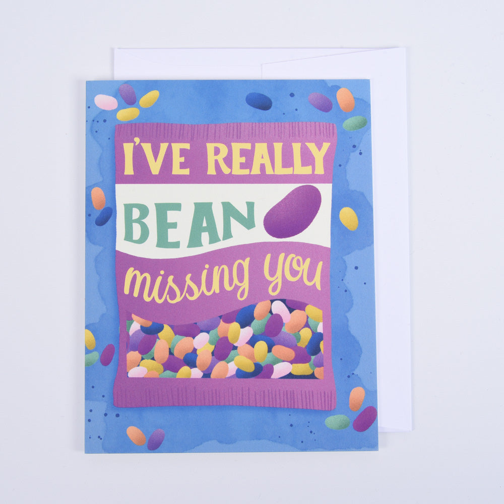 A folded greeting card with a colorful jelly bean design and the text &