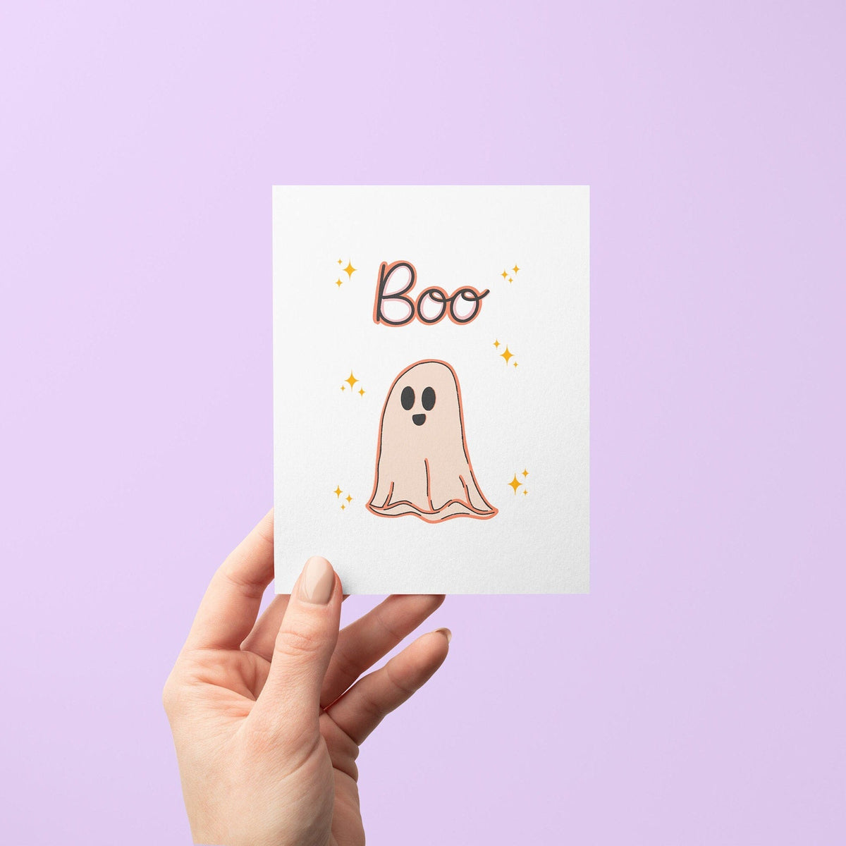 BOO Ghost halloween card flat lay — cute aesthetic Halloween greeting card by indie artist MangoIllustrated