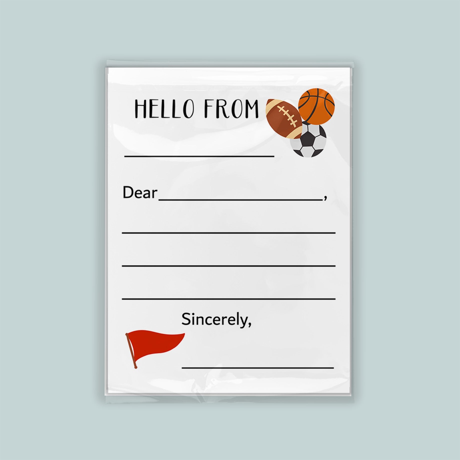 The image is a white envelope with a sports theme, featuring a basketball, soccer ball, and a flag. The envelope has a blank space for a message and a blank space for a name. The message is "Hello from" and the name is "Sincerely," but the rest of the text is not visible in the image.