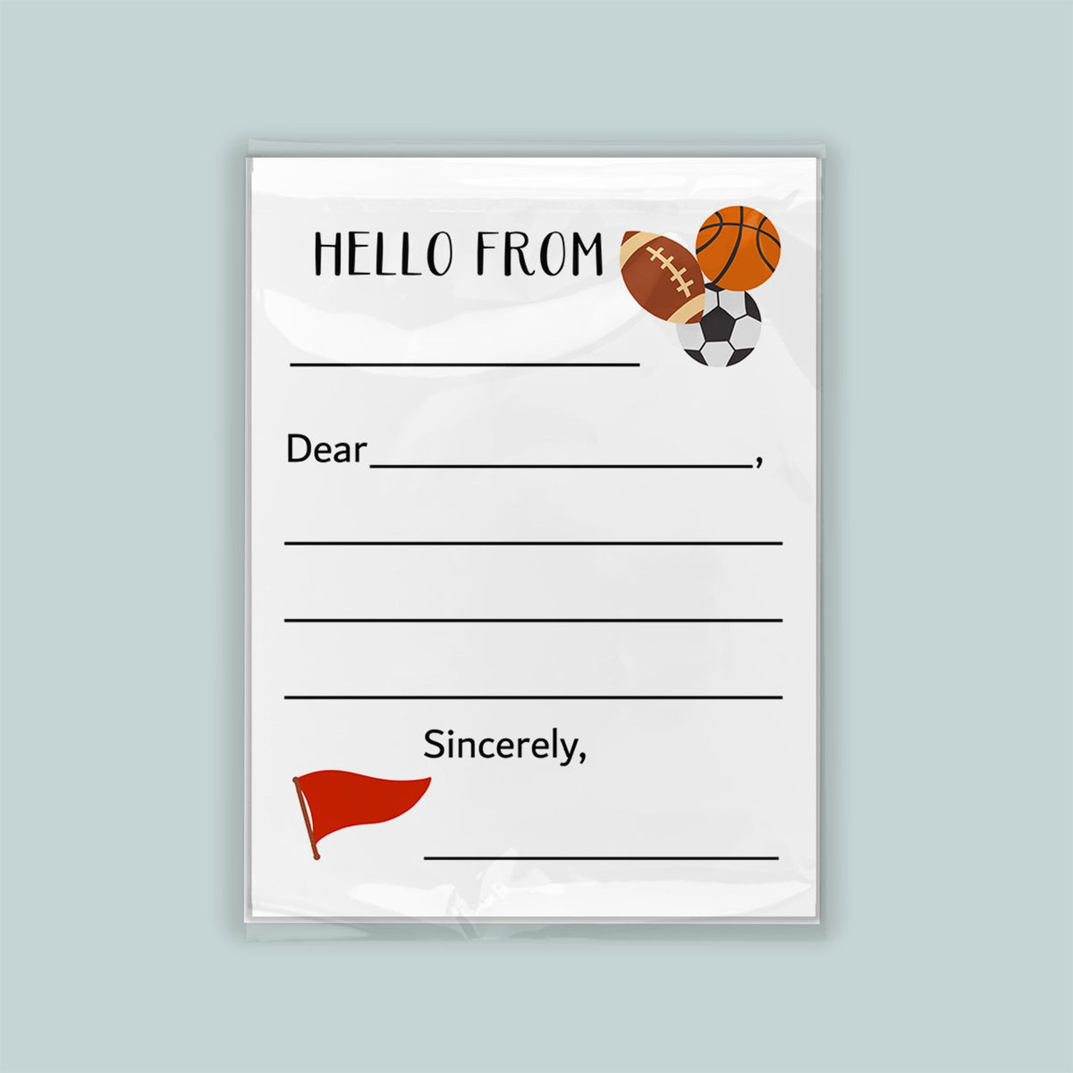 The image is a white envelope with a sports theme, featuring a basketball, soccer ball, and a flag. The envelope has a blank space for a message and a blank space for a name. The message is "Hello from" and the name is "Sincerely," but the rest of the text is not visible in the image.