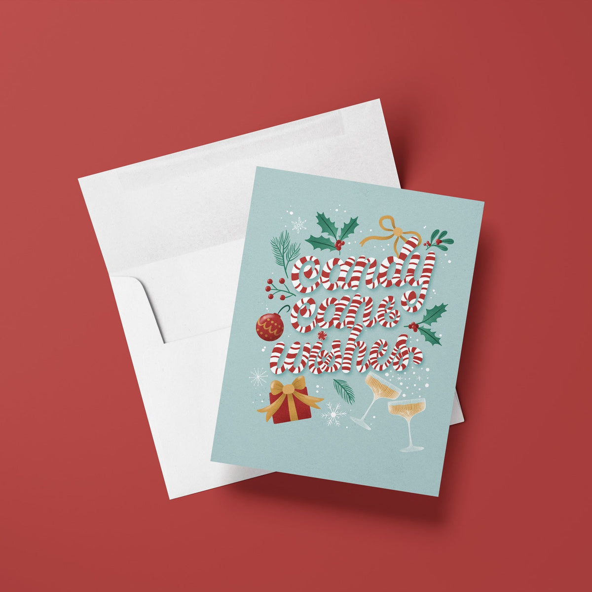 Christmas-themed greeting card with candy cane design on a red background