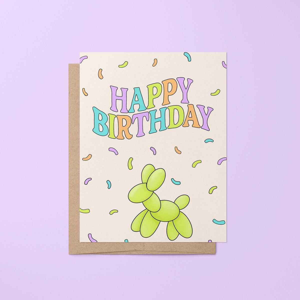 Confetti Happy Birthday card — retro hand lettered happy birthday in purple, blue, green and orange with a green balloon animal dog and confetti, 4.25 x 5.5 in folded, by MangoIllustrated
