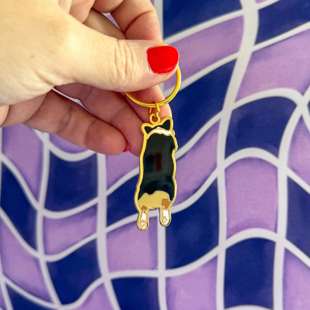 Corgi Sploot enamel keychain scale view — 1.5 by 1 inch corgi bag charm by indie artist MangoIllustrated