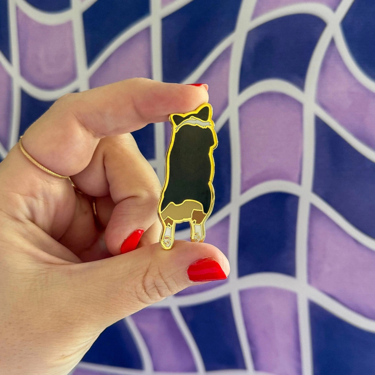 Corgi Sploot enamel pin scale view — 1.5 by 1 inch corgi lover lapel pin by indie artist MangoIllustrated
