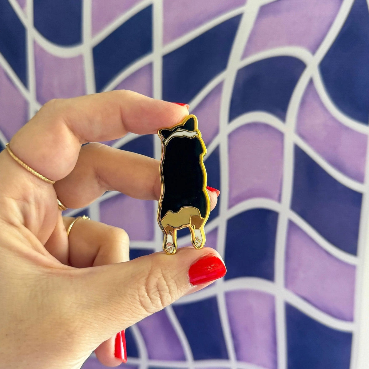 Corgi Sploot enamel pin detail — close up of the tricolor corgi illustration in hard enamel by indie artist MangoIllustrated