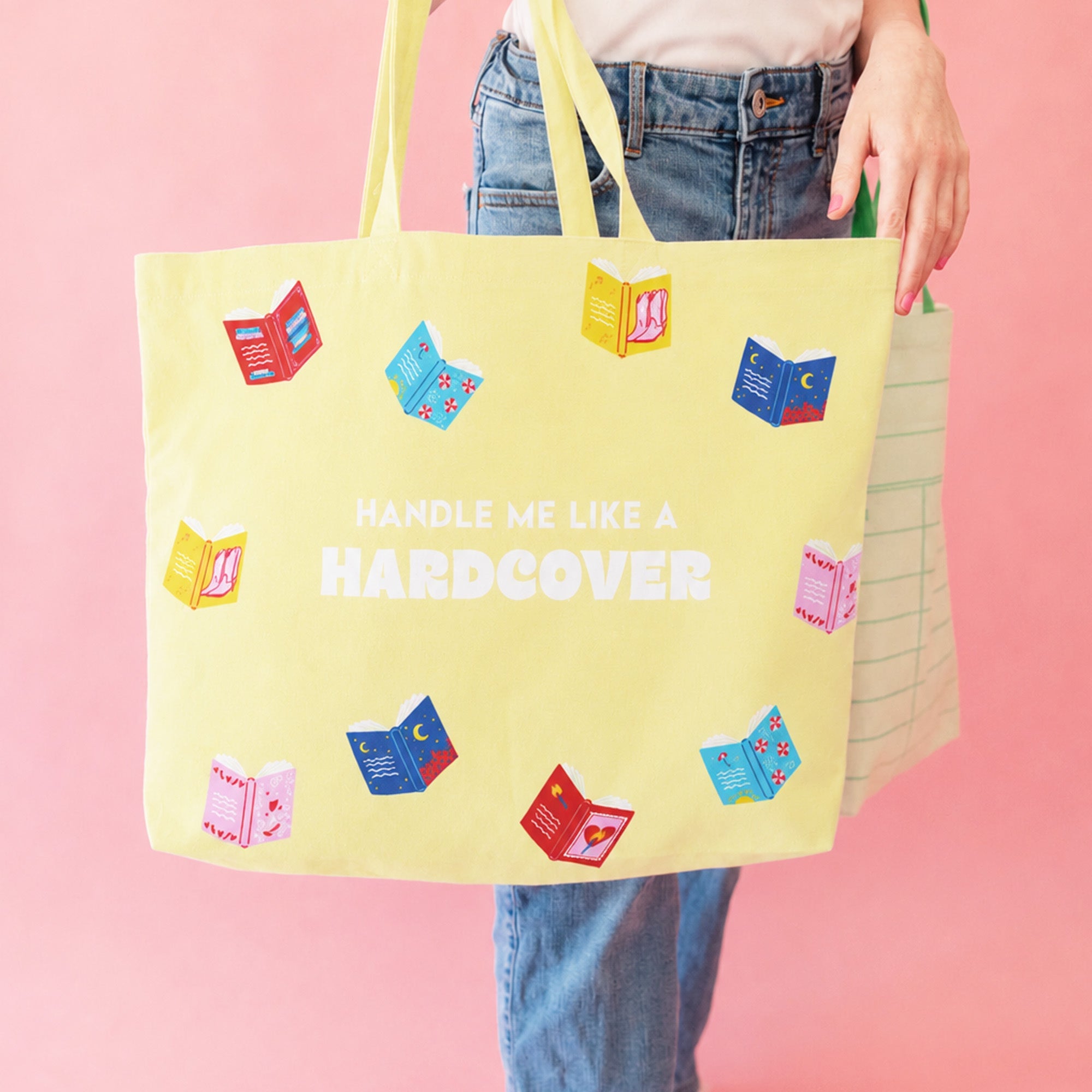 Handle Me Like A Hardcover canvas tote lifestyle shot with books and literary accessories, Jollity & Co.