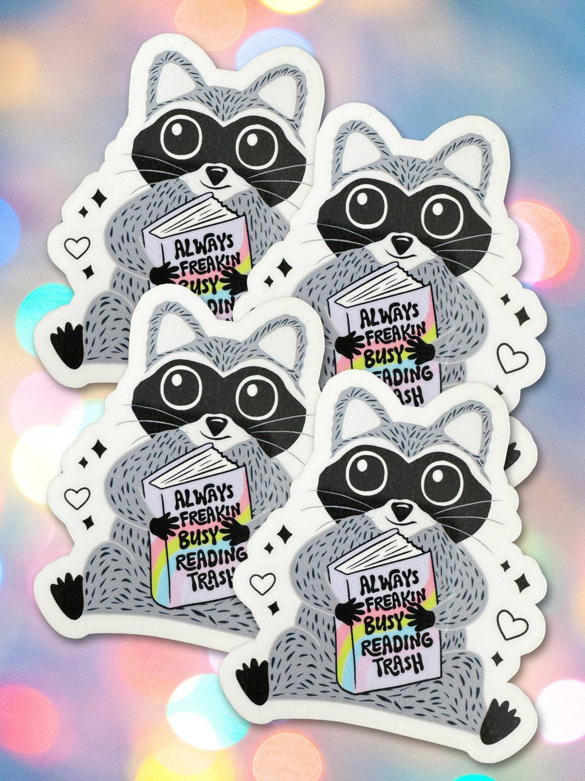 Four raccoon stickers with a colorful background
