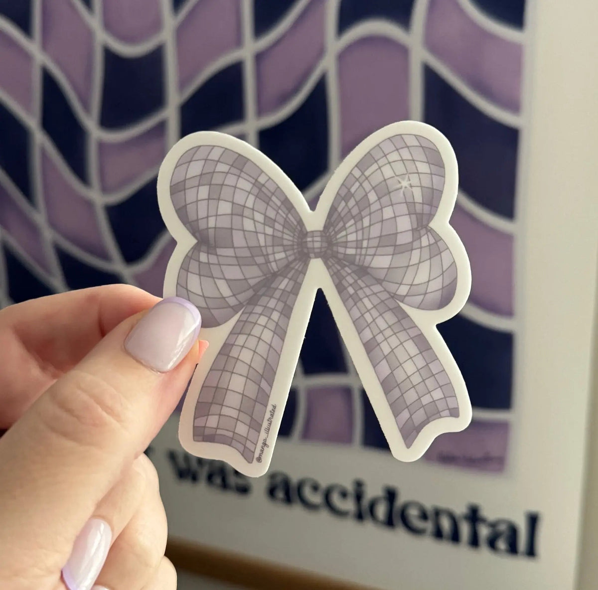 Disco Bow sticker flat lay — coquette disco ball bow vinyl sticker by indie artist MangoIllustrated