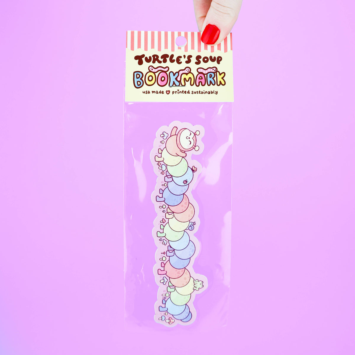 Colorful caterpillar bookmark in packaging with &