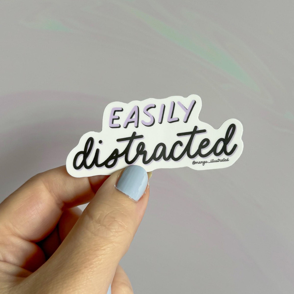 Easily distracted sticker additional view — hand lettered mental health gift sticker by indie artist MangoIllustrated