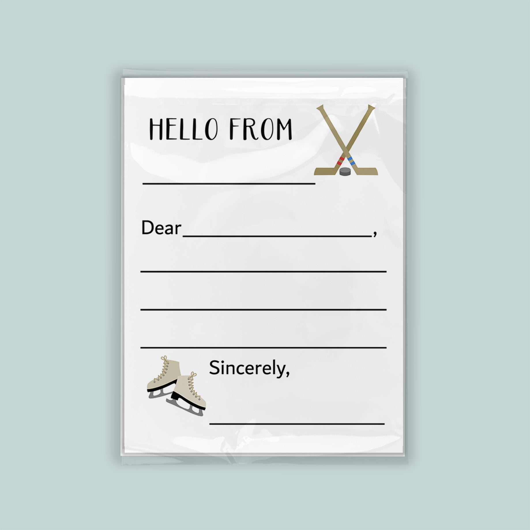 The image is a white envelope with a hockey stick and skates on the front, along with a blank greeting card space for a message.