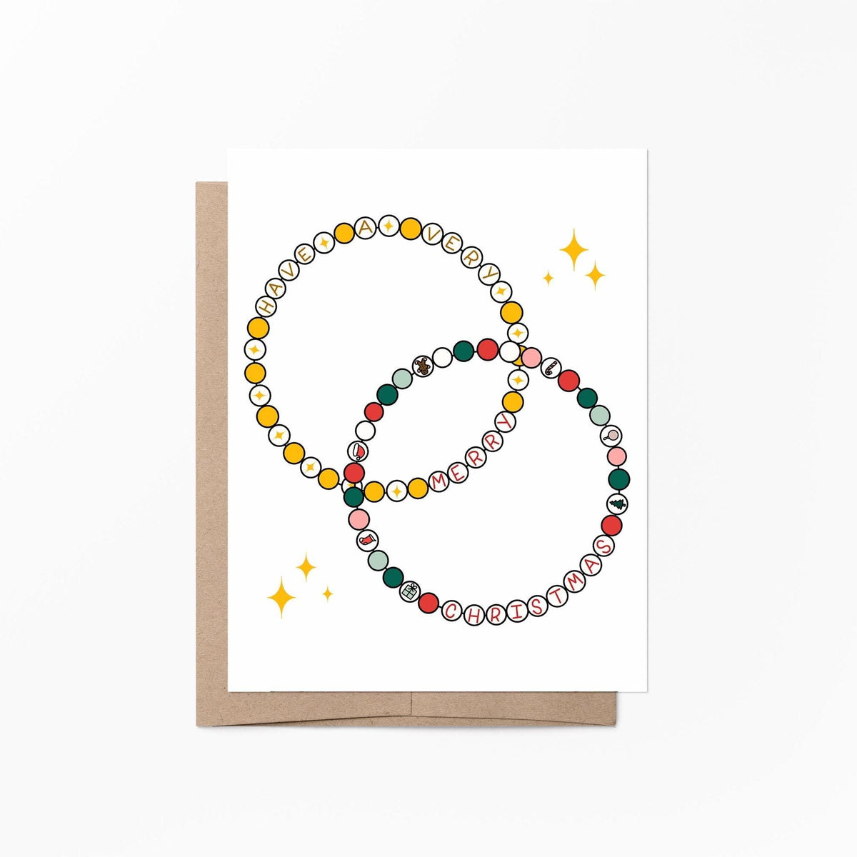 Friendship bracelet Christmas card flat lay — friendship bracelet holiday card styled with holiday greenery, by indie artist MangoIllustrated