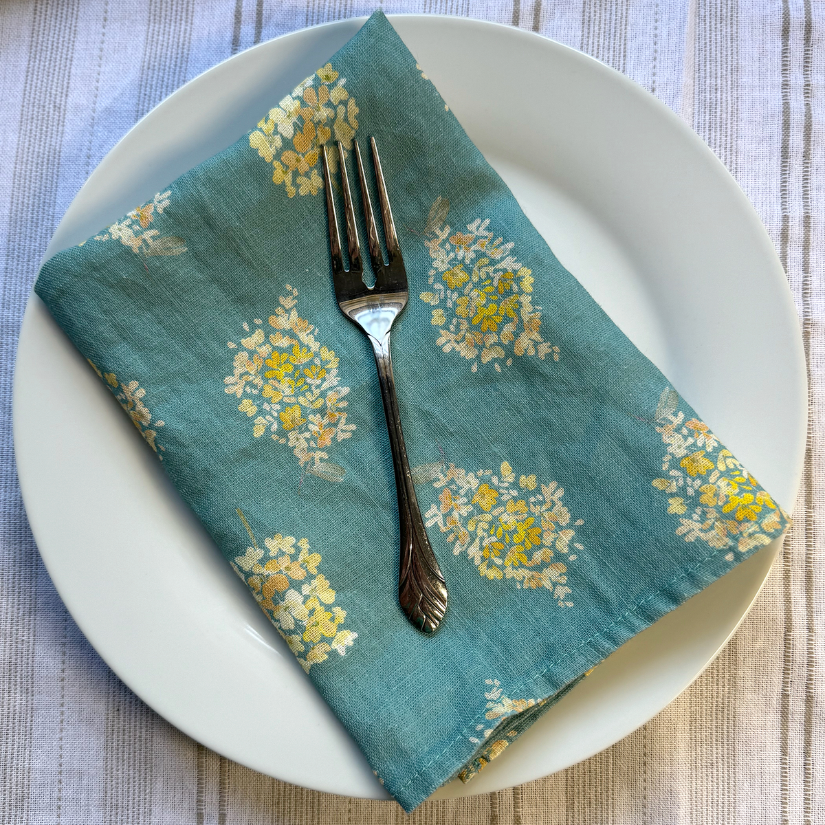 golden hydrangea clusters linen napkins