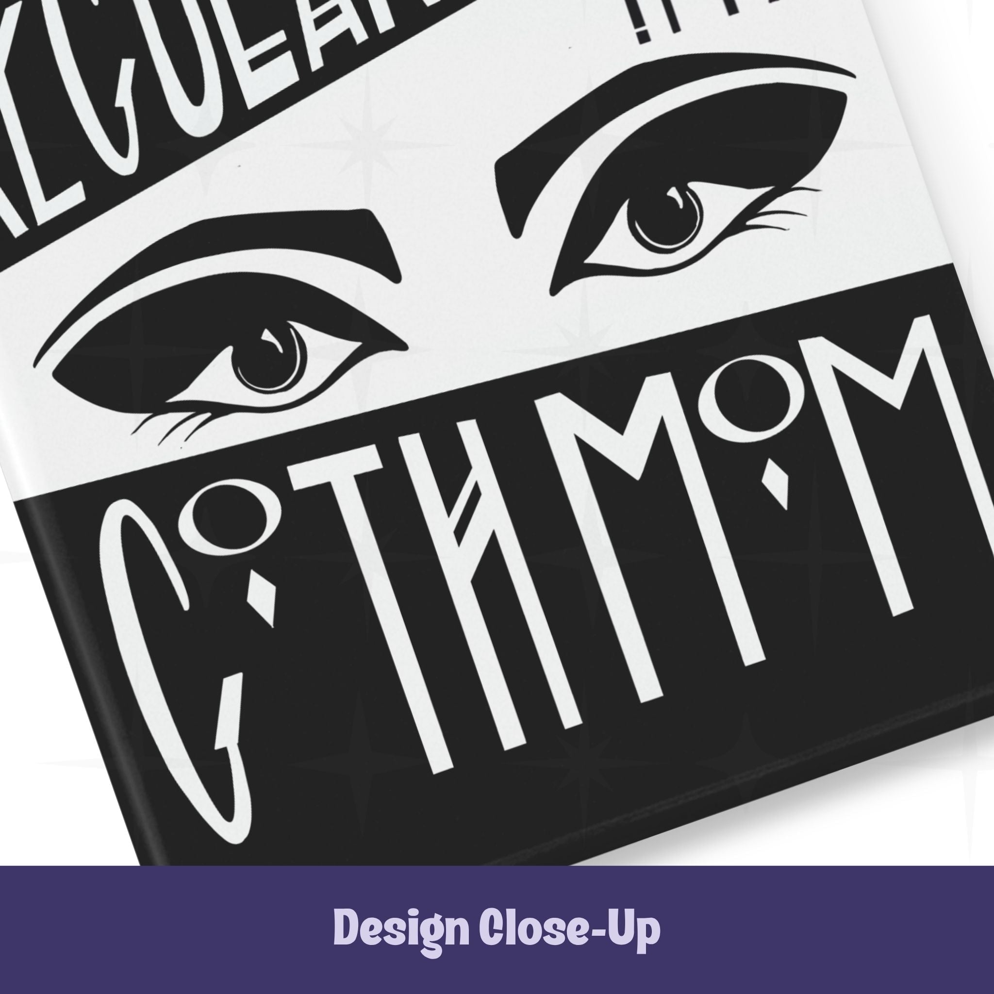 Close-up of bottom section of goth mom magnet showing dramatic illustrated eyes with heavy brows and lashes above Goth Mom lettering on black