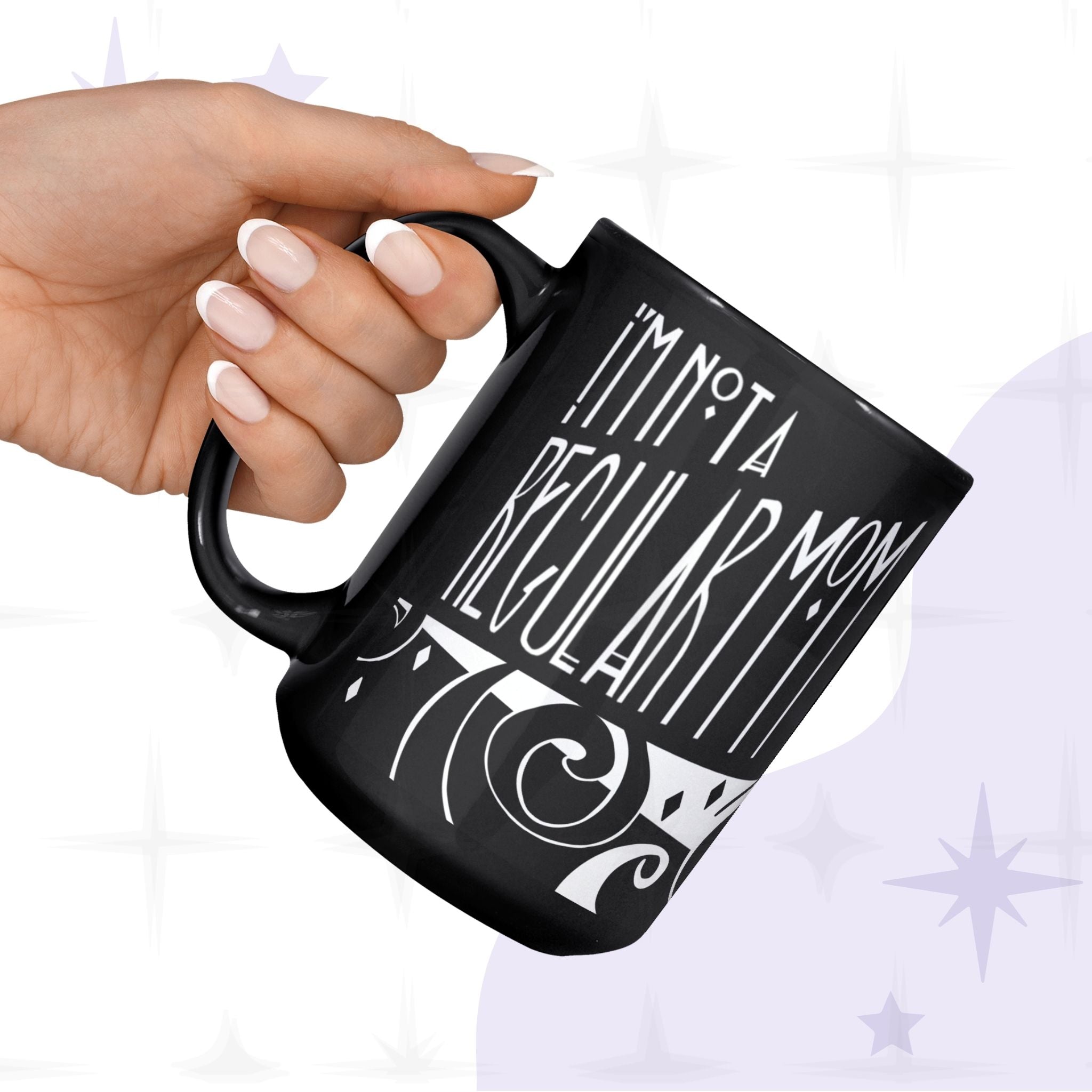 Hand holding black goth mom coffee mug from below showing I&