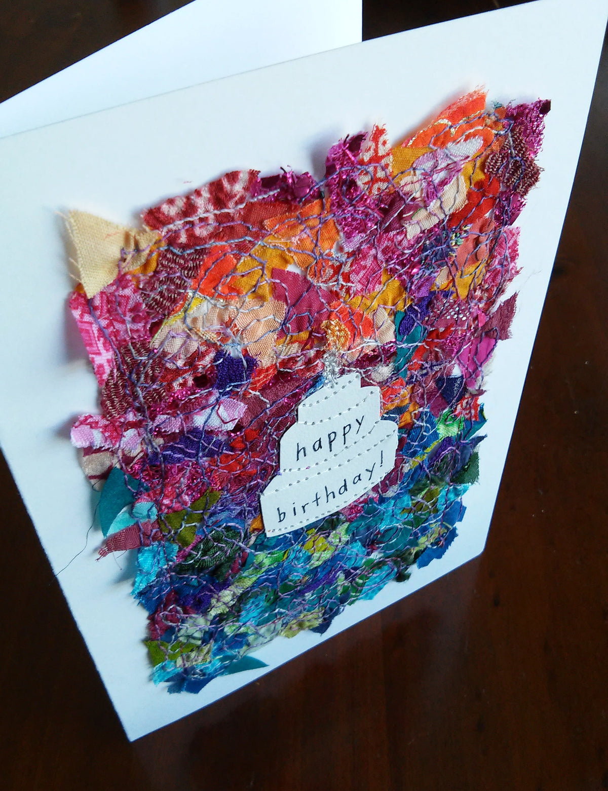 Birthday cake card: 5" x 7", multicolored fabric collage on white, blank inside, with matching envelope