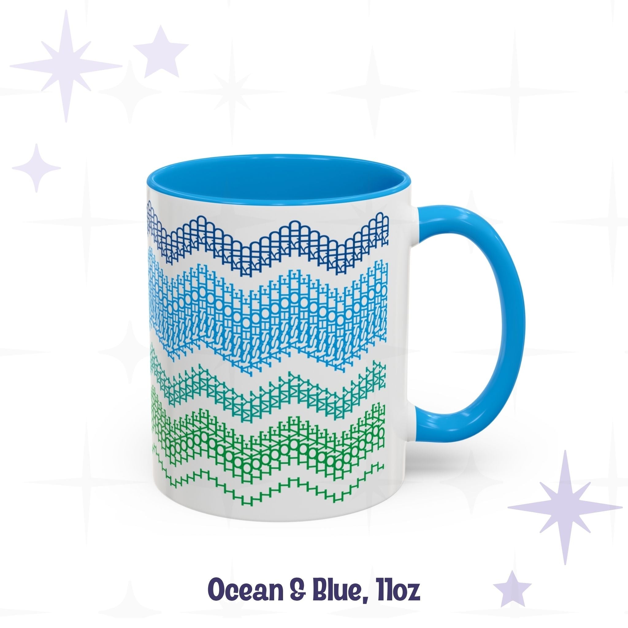 Front view of the Ocean and Blue 11oz hidden message mug with blue handle and blue interior, showing the four-band chevron embroidery pattern, labeled &