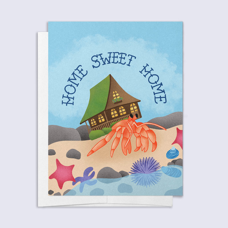 Greeting card with a house, crab, and &