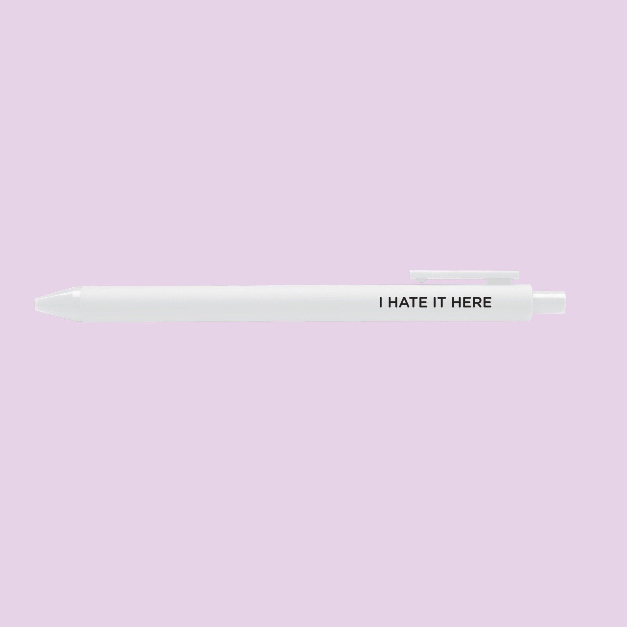 I hate it here jotter gel pen — white barrel with black lettering and black gel ink, 0.5mm fine point, by MangoIllustrated