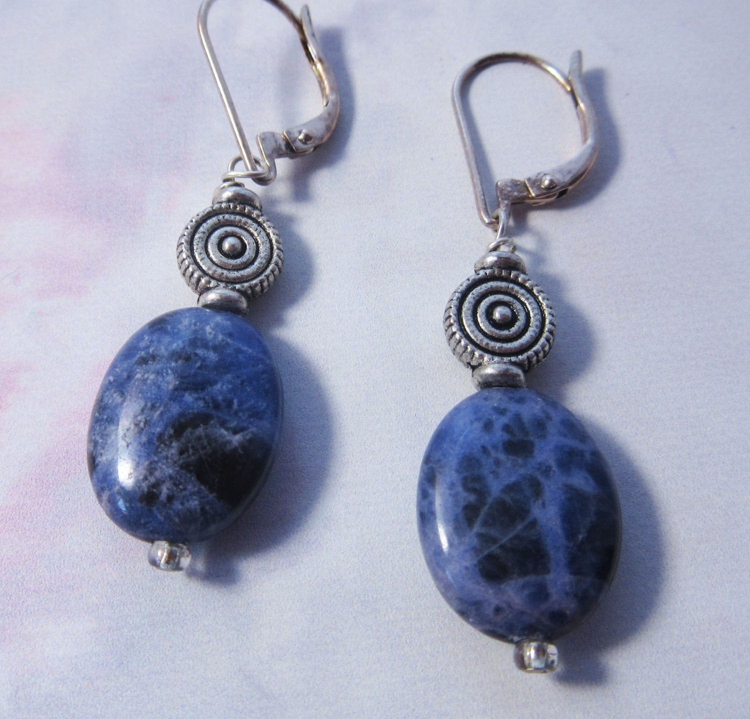 Sodalite earrings - artisan-designed denim blue stone and spiral earrings, perfect gift for creativity and self-expression.