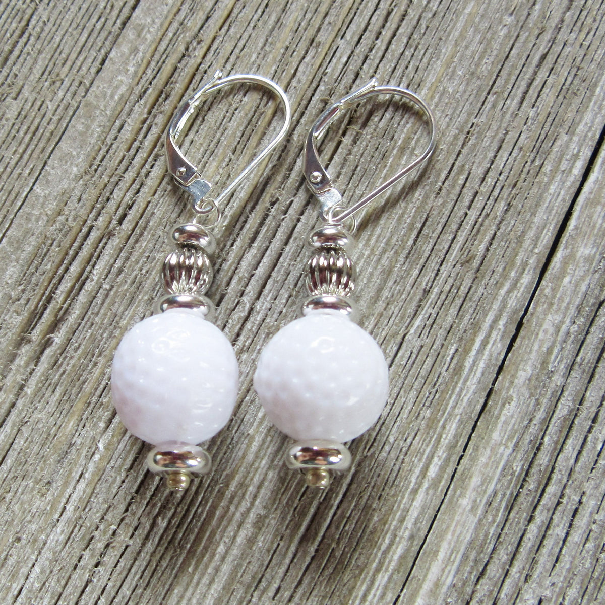Golf Earrings a Gift for Woman Golfer, displayed on a white background showcasing the fun golf ball theme.