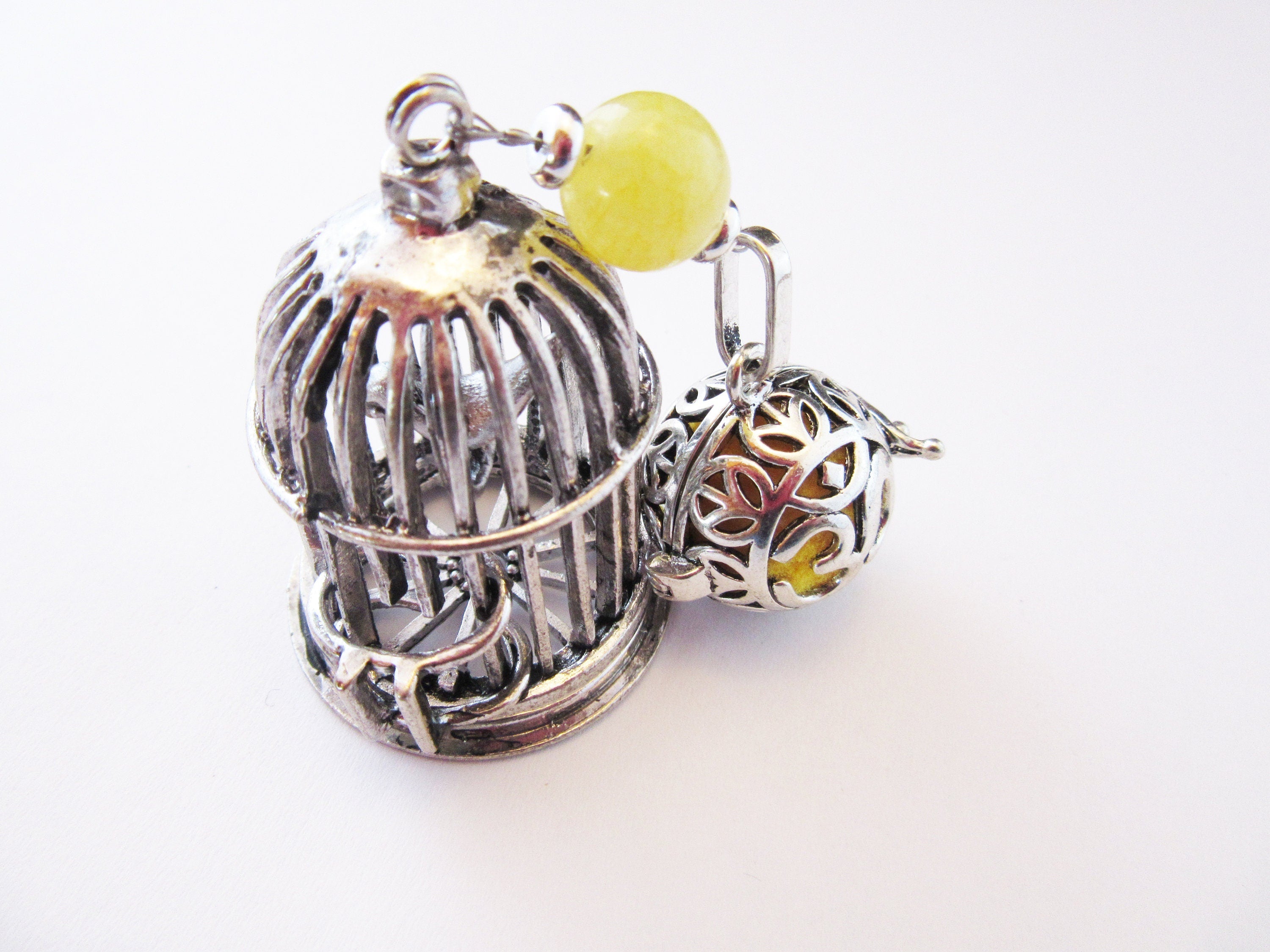 Bird Cage Essential Oil desk sitter in a serene setting, showcasing its portable design and zen style; ideal for enhancing any space.