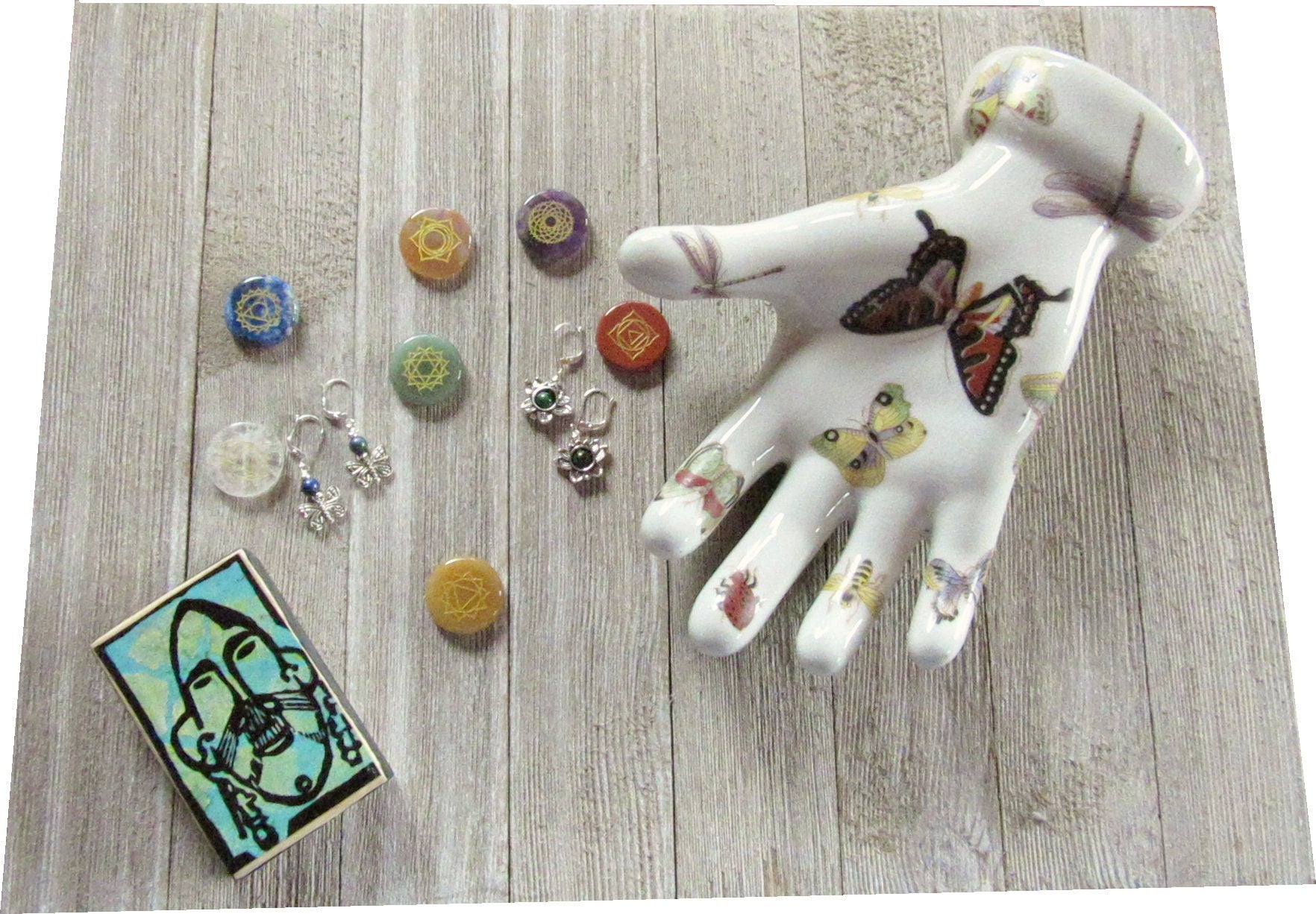 Close up of butterfly earrings - mood bead jewelry showcasing silver woodland animal design, ideal gift for nature enthusiasts and teens.