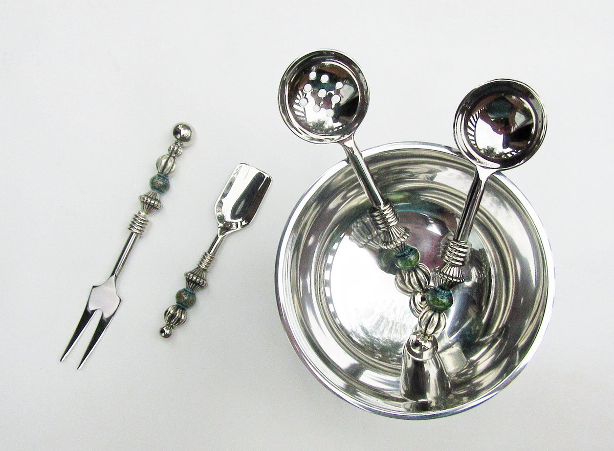Party serving set featuring custom design stainless steel fork and slotted spoon, perfect for hosting.